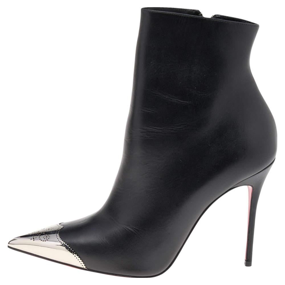 These boots from the house of Christian Louboutin are urban and sophisticated! Crafted in leather, they feature catchy Calamijane metal cap pointed toes along with side zip fastenings. The insoles are leather lined and carry brand labeling. This