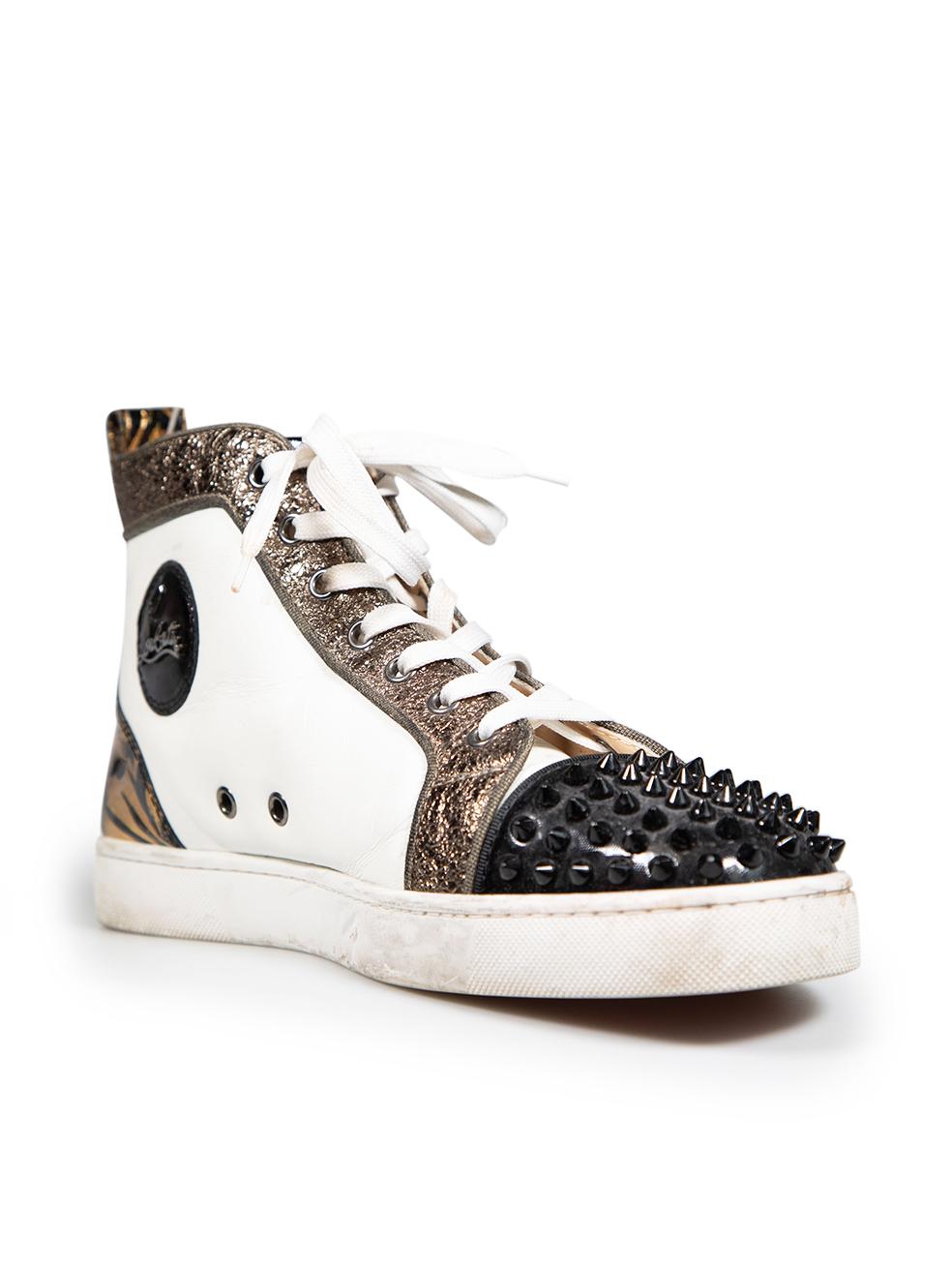 CONDITION is Good. Minor wear to sneakers is evident. General creasing of leather on both shoes. Staining of outsoles due to general wear, light discolouration of shoelaces and discolouration of aglets on both pairs on this used Christian Louboutin