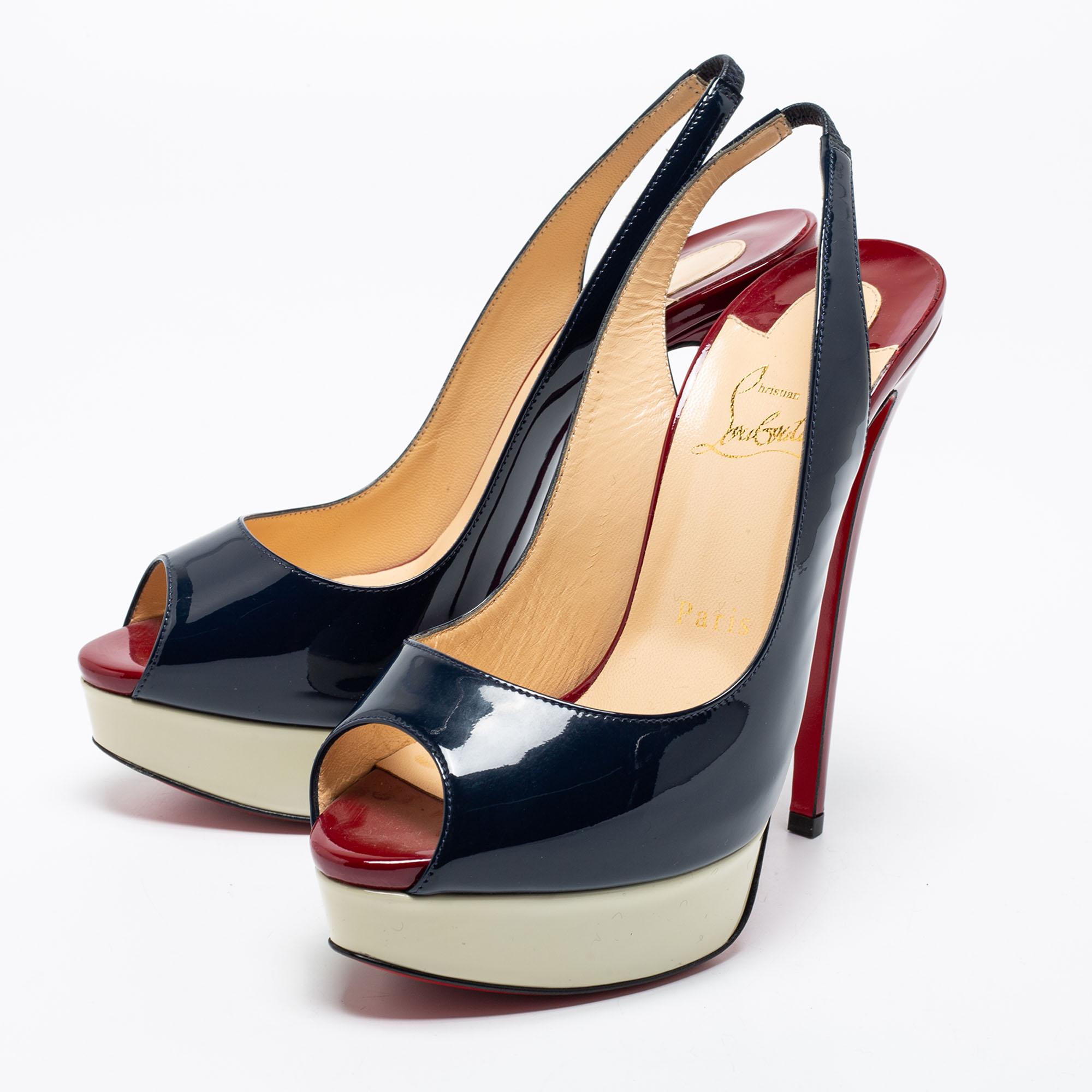 Stand out from the crowd with this gorgeous pair of Louboutins that exude high fashion with class! Crafted from patent leather, they feature three colors and a glossy exterior. Completed with peep-toes, leather insoles, 14 cm high heels, and
