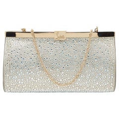 Christian Louboutin Clutch piccola in pelle con cristalli e palmette Moonlight