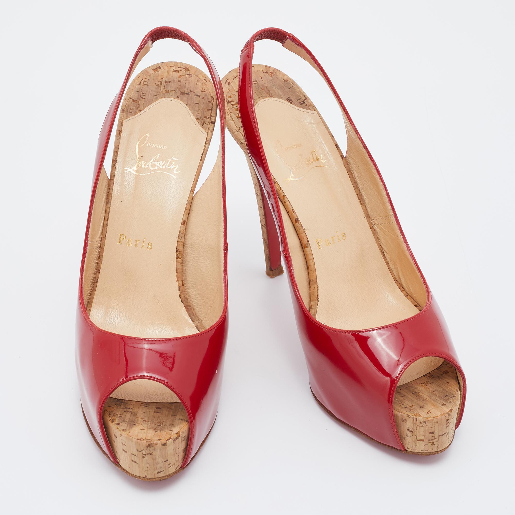 Make your feet feel special by flaunting these lovely Christian Louboutin sandals. The red patent leather exterior and towering heels lend a glamorous appeal to the slingback sandals. Leather soles provide a sturdy finish to this perfect party