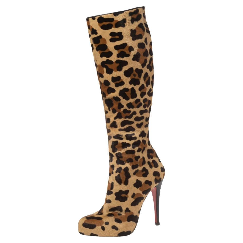 These captivating Fifi Botta knee-length boots by Christian Louboutin have been finely crafted in leopard print pony hair and come with covered toes and full back zippers The boots are lifted on 12 cm stiletto heels.

