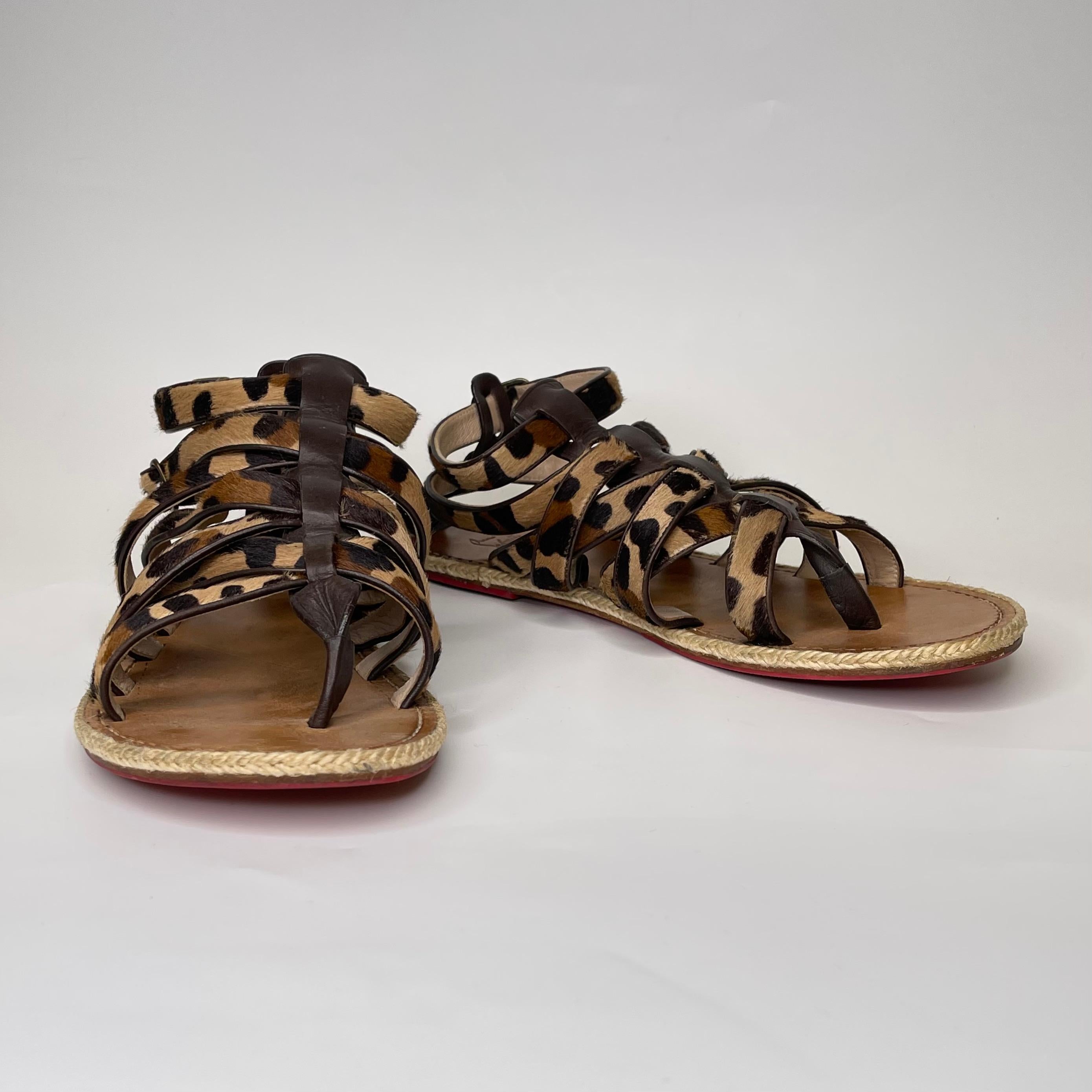 COLOR\MATERIAL: Brown leopard print pony hair and brown leather
SIZE: 44 EU / 11 US
COMES WITH: Box
CONDITION: Good - marks, stains, indentations to the bottoms. The shoe is stored in a box and stuffed, but some of the straps looks misinformed.