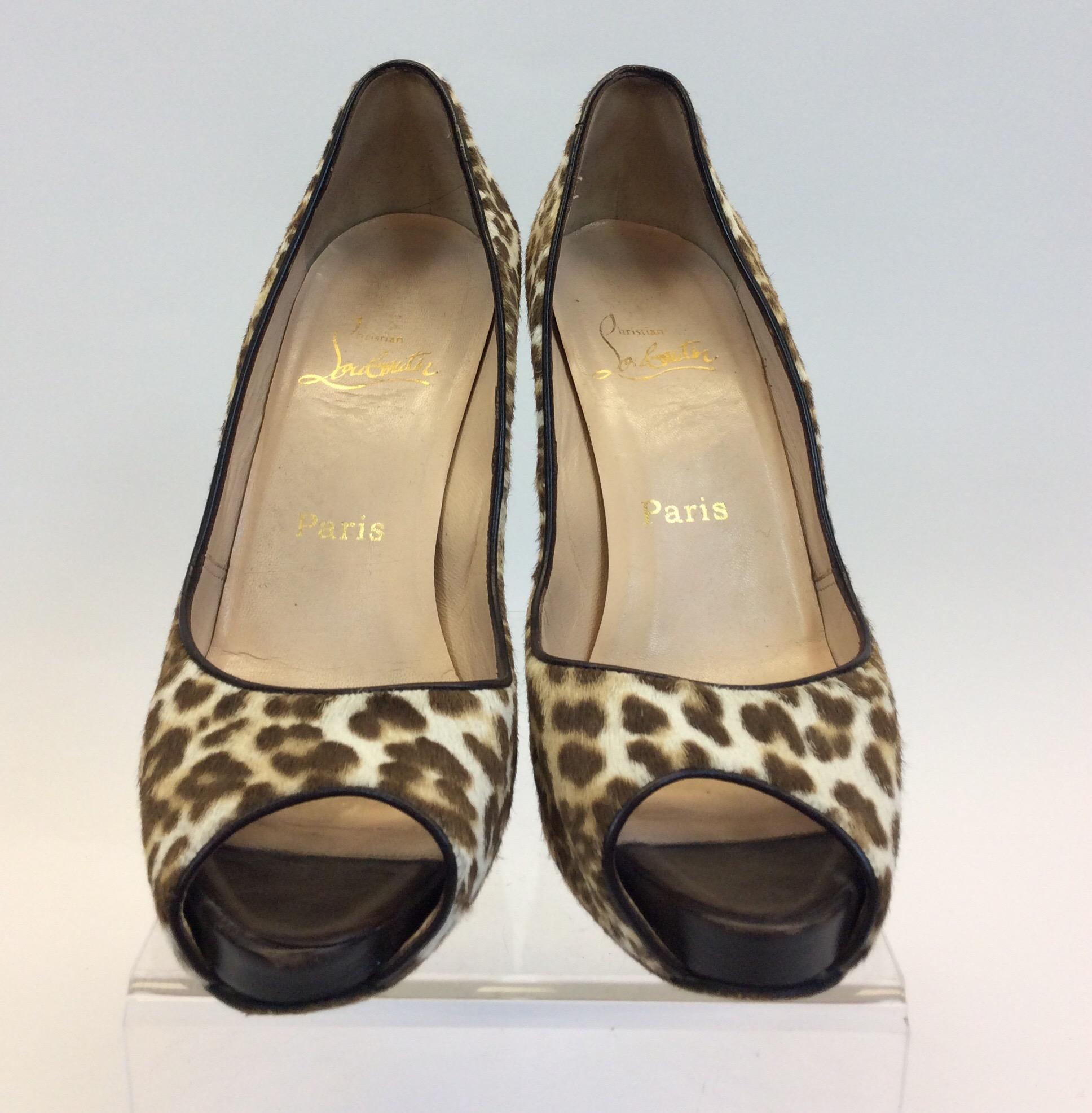 Christian Louboutin Leopard Print Horse Hair Heels 
$199
Made in Italy 
Size 39
Heel: 4.5”
Platform: .75”