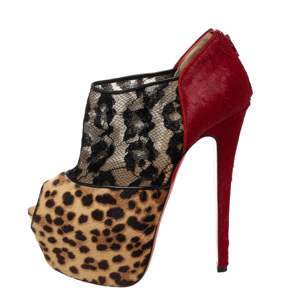 Impeccably crafted into a stylish silhouette, these Aeronotoc booties from Christian Louboutin are truly striking. Featuring black lace, leopard printed pony hair, and red pony hair, the high stiletto shoes make a bold statement and are sure to make