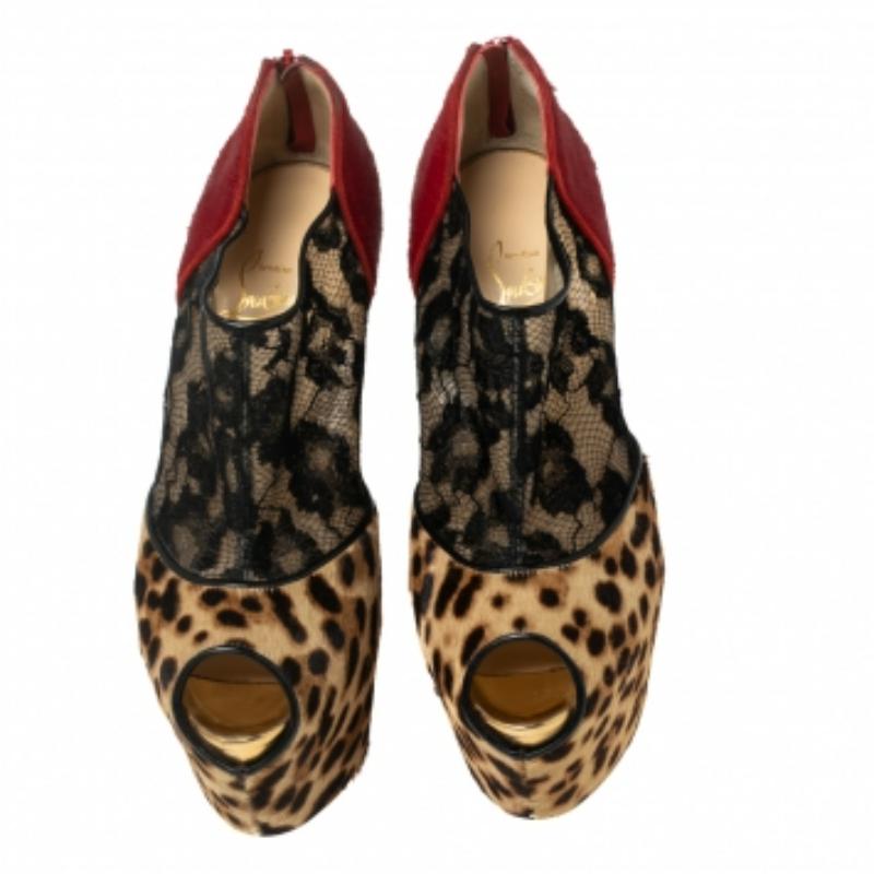Christian Louboutin Leopard Print Pony Hair and Lace Aeronotoc Booties Size 37.5 In Excellent Condition In Dubai, Al Qouz 2