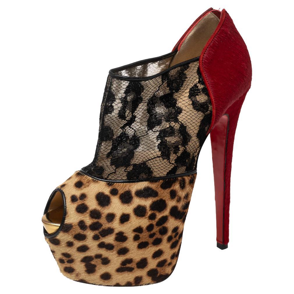 Christian Louboutin Leopard Print Pony Hair and Lace Aeronotoc Booties Size 37.5 For Sale