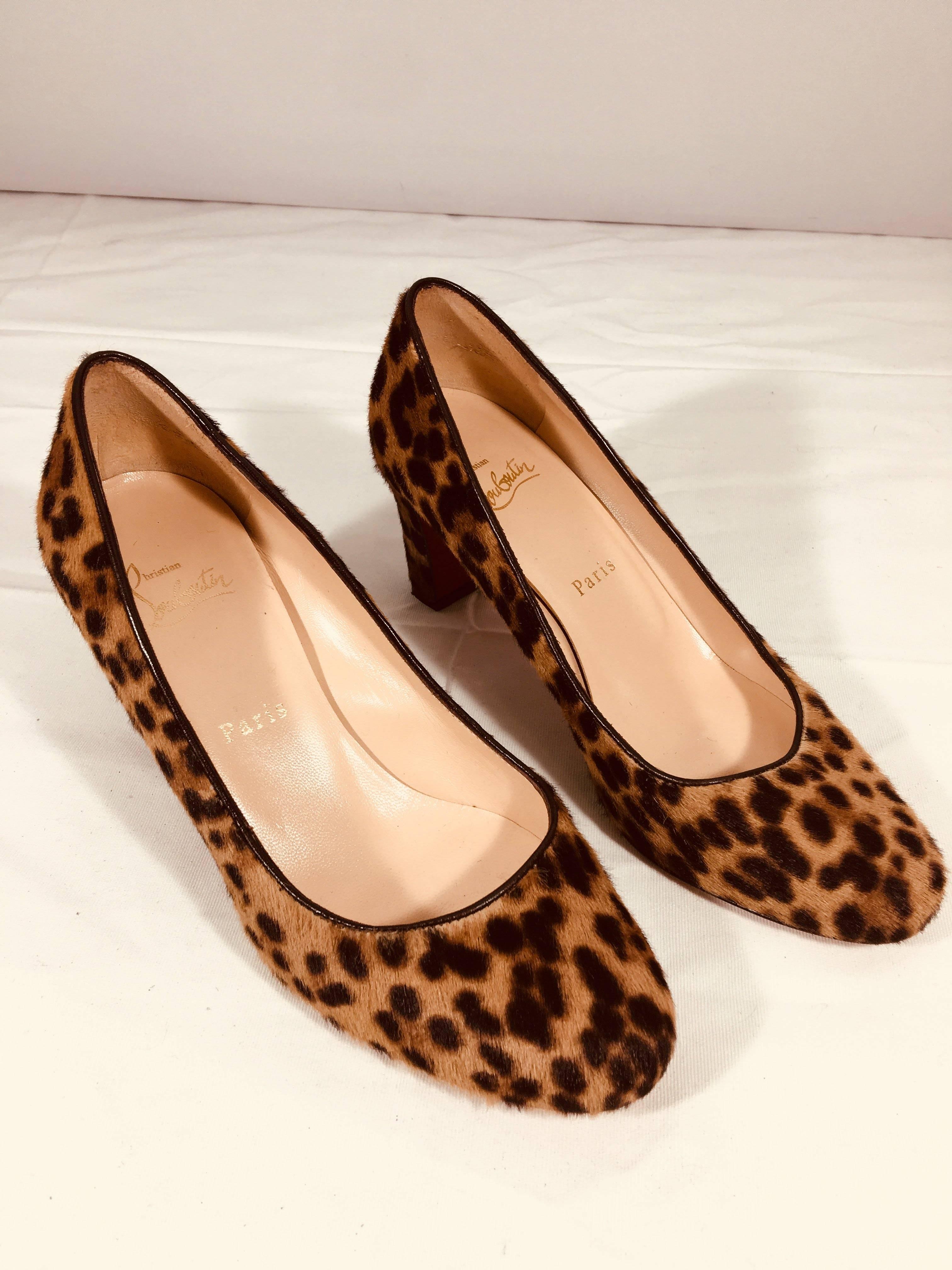 Christian Louboutin Leopard Pumps. Camel/Chocolate Pony Hair in Leopard Print with Round Toe and Chunky Heel.