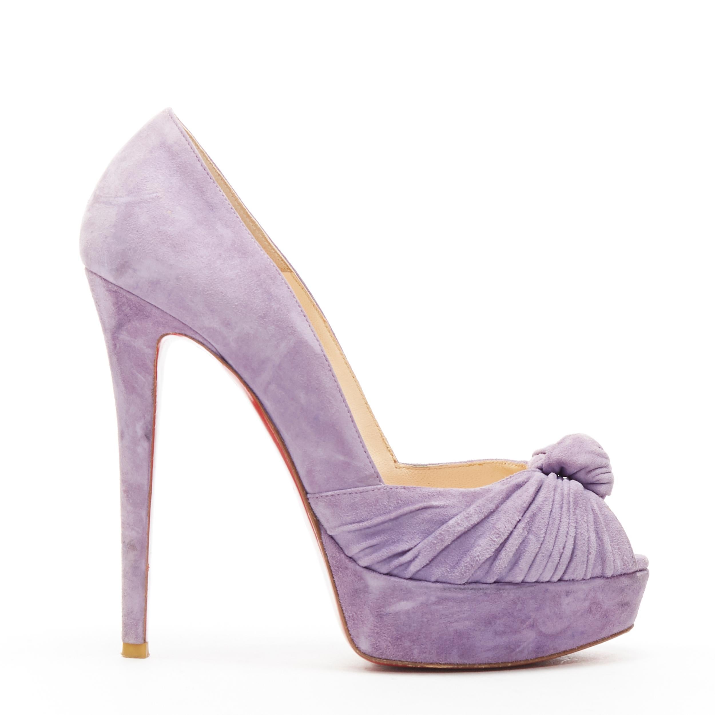 CHRISTIAN LOUBOUTIN lilac purple suede knot front peep toe platform pump EU38
Brand: Christian Louboutin
Designer: Christian Louboutin
Model Name / Style: Knot platform
Material: Suede
Color: Purple
Pattern: Solid
Extra Detail: Ultra High (4 in &