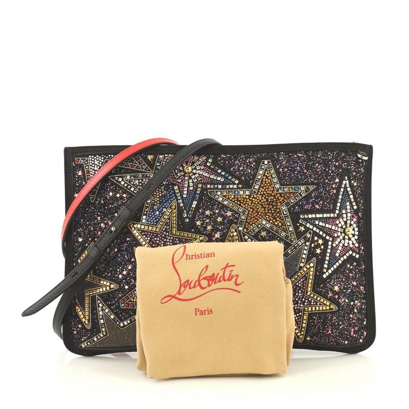 This Christian Louboutin Loubiclutch Embellished Leather, crafted from black beaded leather, features a removable leather strap and gold-tone hardware. Its zip closure opens to a red fabric interior with slip pocket. 

Estimated Retail Price: