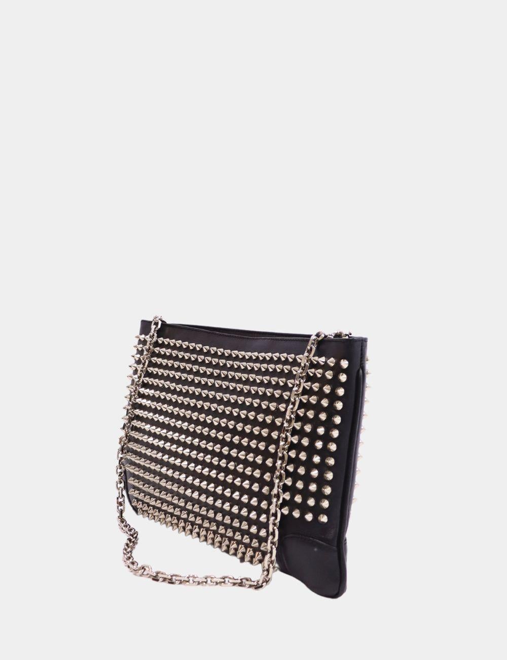 Christian Louboutin Loubiposh Clutch, features a silver studs, removable chain-Link shoulder strap, and interior pocket.

Material: Leather
Hardware: Silver
Height:19cm
Width: 30cm
Depth: 1.5cm
Shoulder Drop: 29cm
Overall condition: Good4
Interior