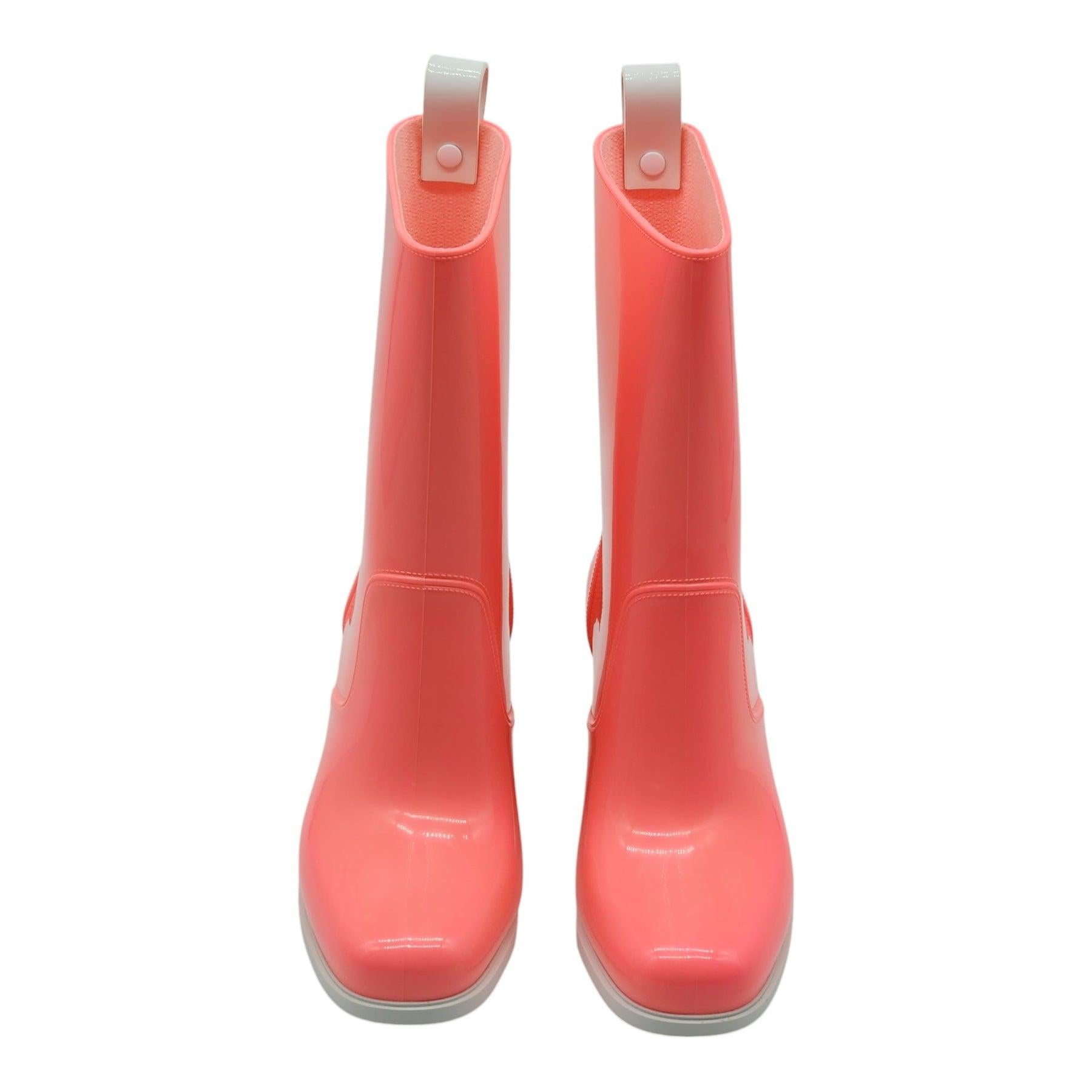 Christian Louboutin Loubirain Boots - PVC in Pink Size 34.

Additional information:
Material: PVC upper, rubber bottoms. 
Color: Pink
Size 34 (4 US)
Country: Italy
Dimension: Heel height 70mm (2.75 inches)
Condition: Brand new with box.
