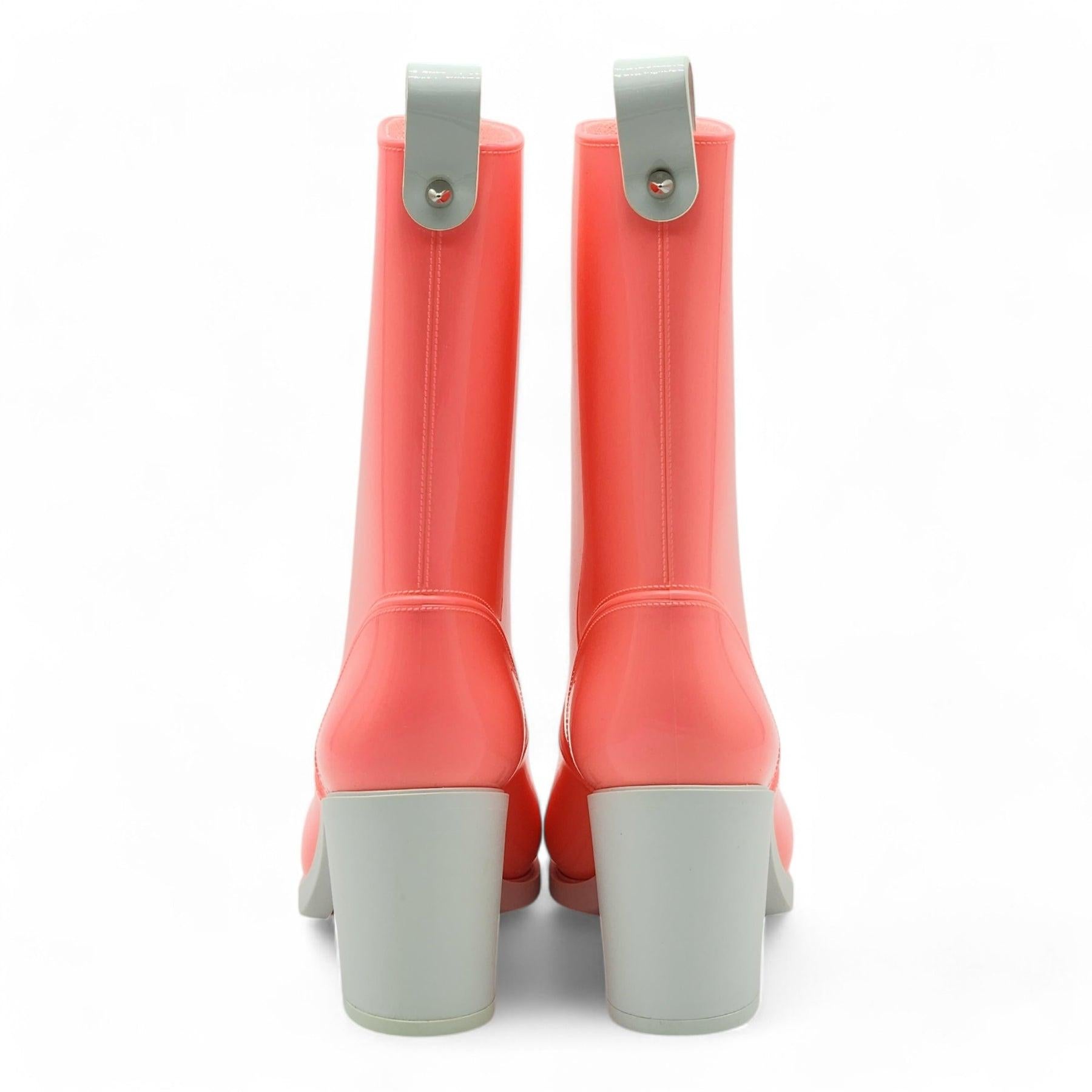 Christian Louboutin Loubirain Boots - PVC in Pink Size 34 In Excellent Condition For Sale In Los Angeles, CA