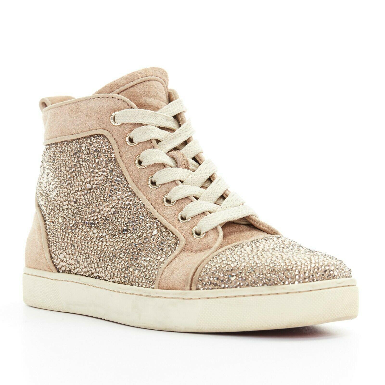 CHRISTIAN LOUBOUTIN Louis dusty rose strass crystal high top sneakers EU38.5
CHRISTIAN LOUBOUTIN
Louis Flat Strass sneakers. Dusty pink suede leather upper. Swavovski crystal strass embellishment on side and at toe. Lace up front. Leather trimming