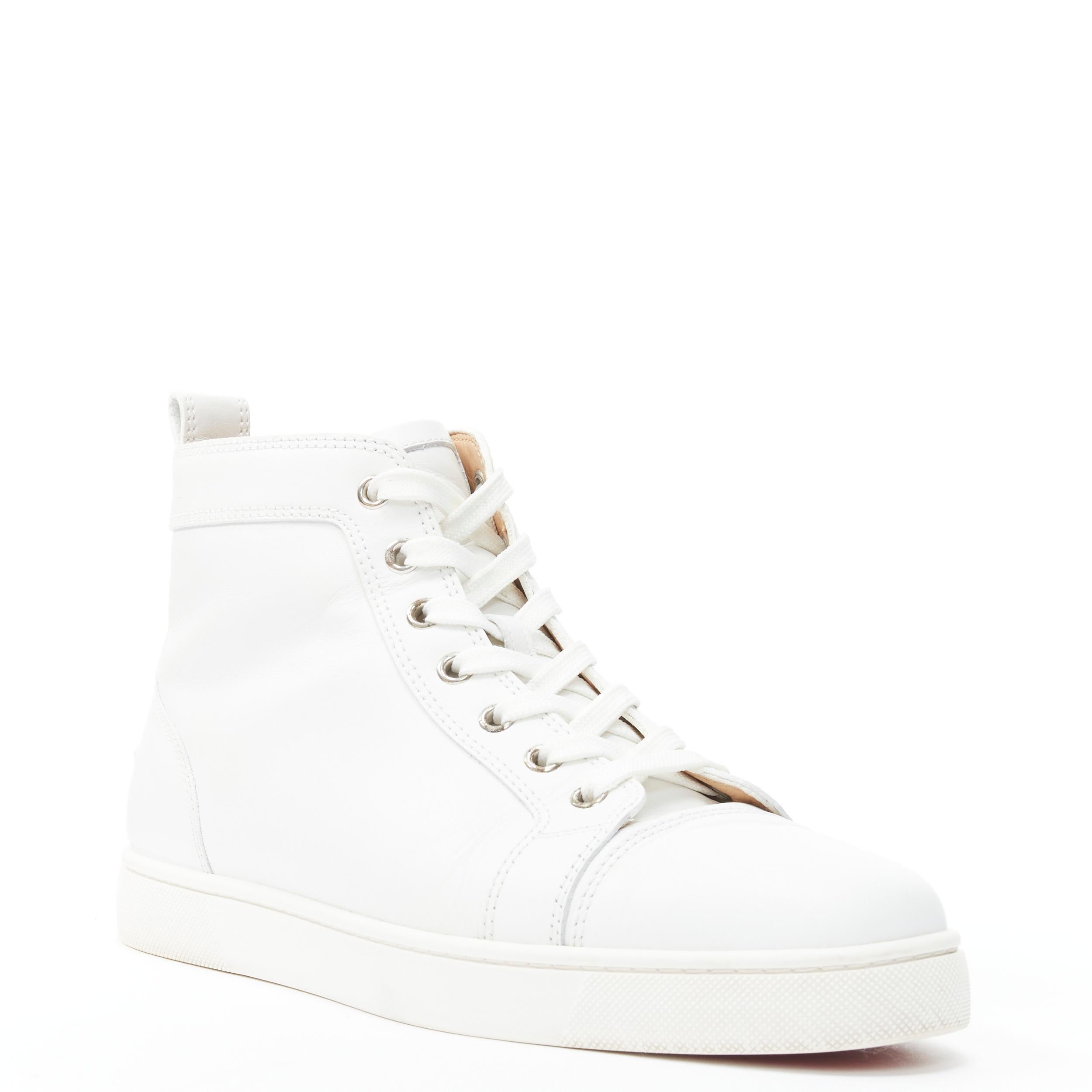 CHRISTIAN LOUBOUTIN Louis logo emblem white leather minimal hi top sneaker EU40 Reference: TGAS/B01814 
Brand: Christian Louboutin 
Designer: Christian Louboutin 
Model: Louis 
Material: Leather 
Color: White 
Pattern: Solid 
Closure: Lace Up 
Made