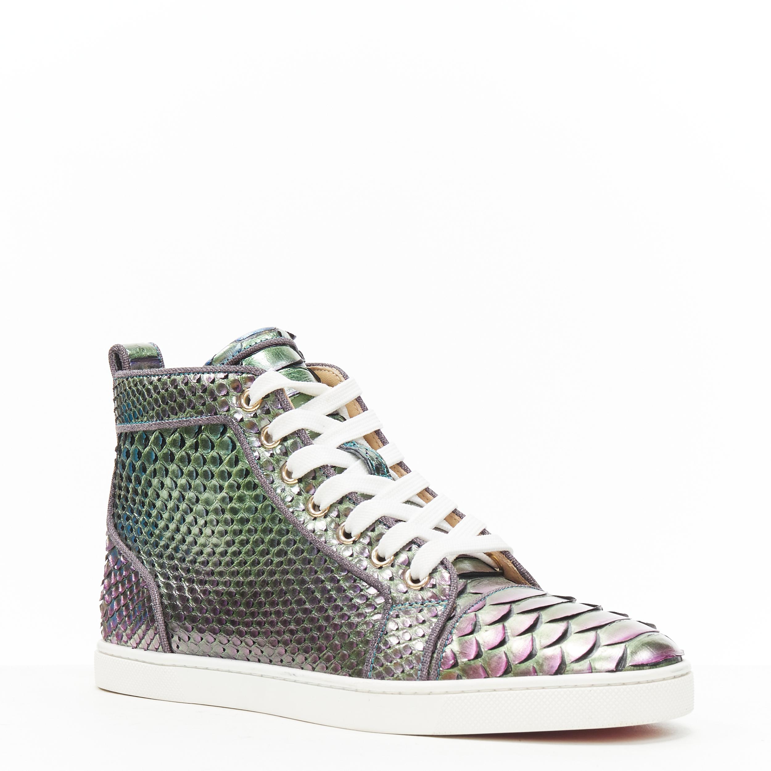 CHRISTIAN LOUBOUTIN Louis Orlato green purple iridescent scaled sneaker EU38 Reference: TGAS/B01133 
Brand: Christian Louboutin 
Designer: Christian Louboutin 
Model: Louis Orlato Python 
Material: Leather 
Color: Green 
Pattern: Solid 
Closure: