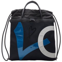 Christian Louboutin Love patchwork heart studded drawstring backpack tote bag