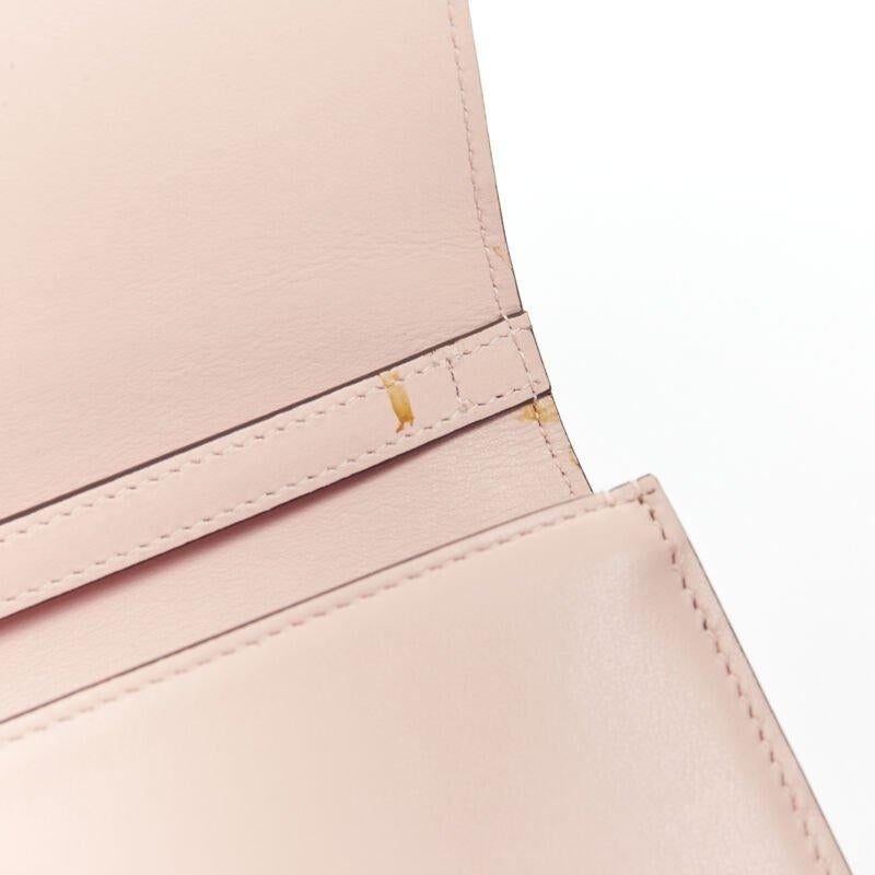 Donna CHRISTIAN LOUBOUTIN Pochette con portafoglio con borchie a spillo Macaron rosa oro in vendita