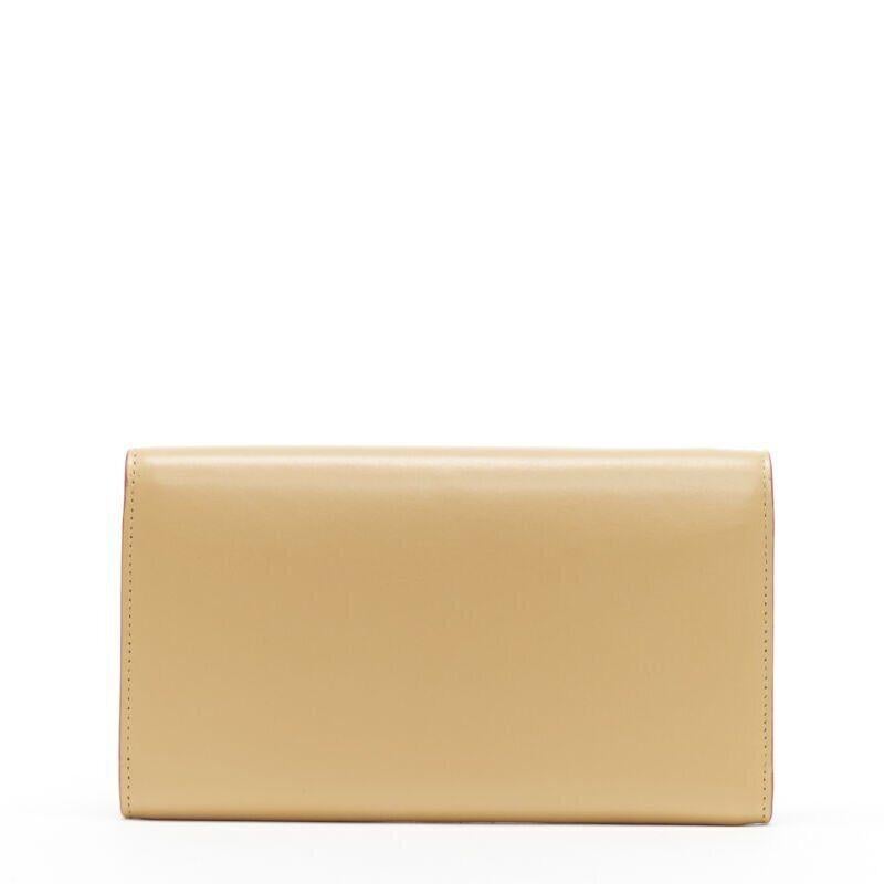 CHRISTIAN LOUBOUTIN Macaron tan brown gold spike stud wristlet long wallet
Reference: TGAS/A05780
Brand: Christian Louboutin
Model: Macaron
Material: Leather
Color: Brown, Gold
Pattern: Solid
Closure: Button
Extra Details: Gold-tone spike stud