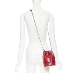 CHRISTIAN LOUBOUTIN Marie Jane red signature logo bucket crossbody bag