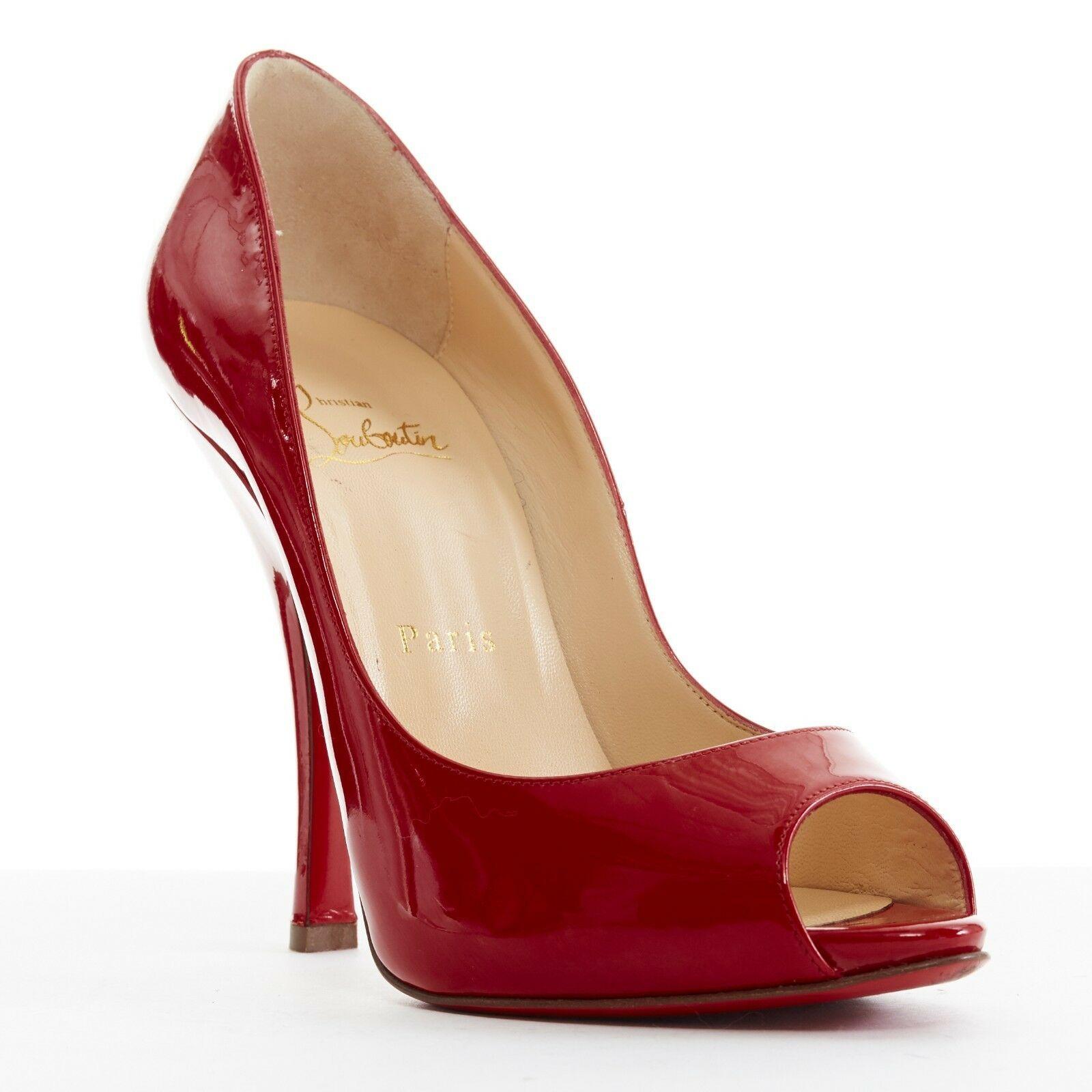 CHRISTIAN LOUBOUTIN Maryl 120 red patent curved heel peeptoe heels EU37.5 US7.5
CHRISTIAN LOUBOUTIN
Maryl 120. 
Red patent. 
Peep toe. 
Covered heel. 
Curved thick heel.
Tan leather lining. 
Signature Christian Louboutin red lacquered leather sole.