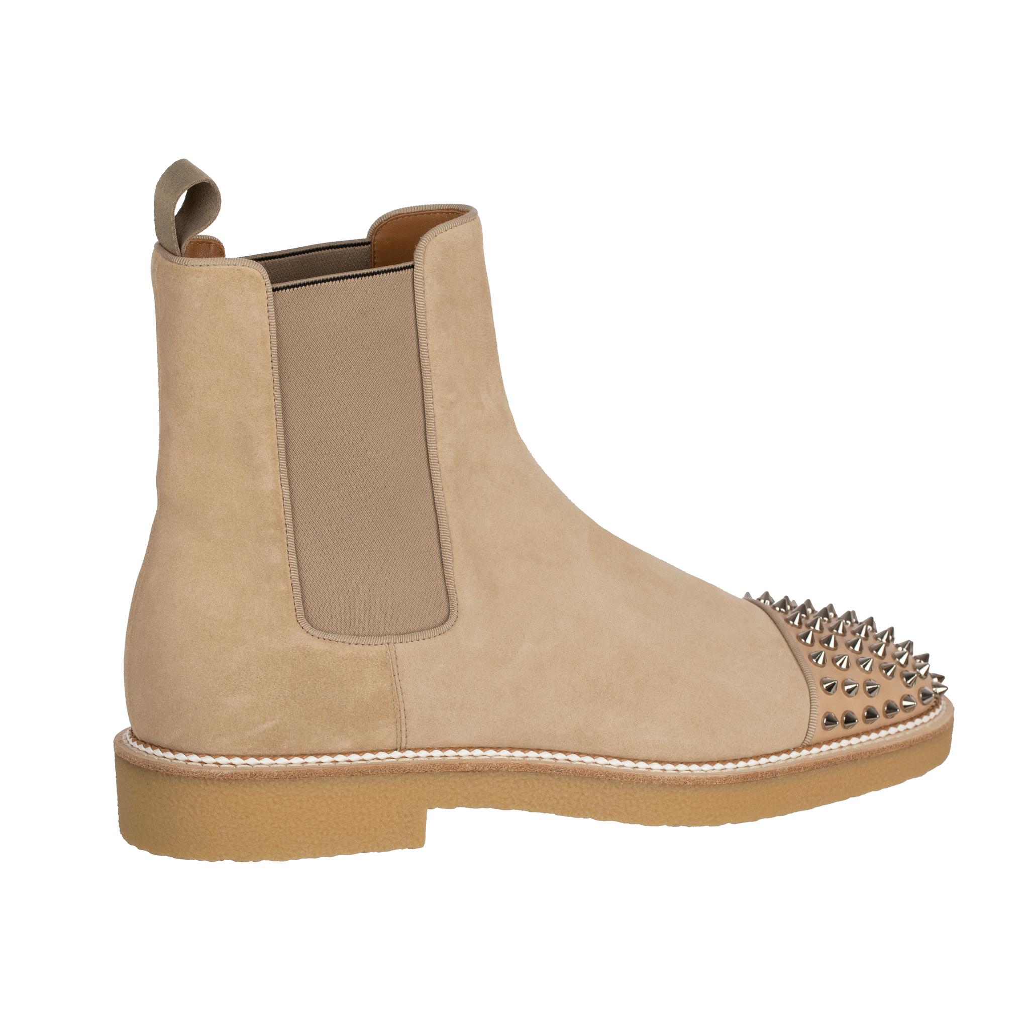 
Brand: Christian Louboutin

Product: Boots

Size: 41.5 FR

Colour: Beige

Material: Suede & Studs

Condition: Pristine; Never Worn

Accompanied By: Boots Only

