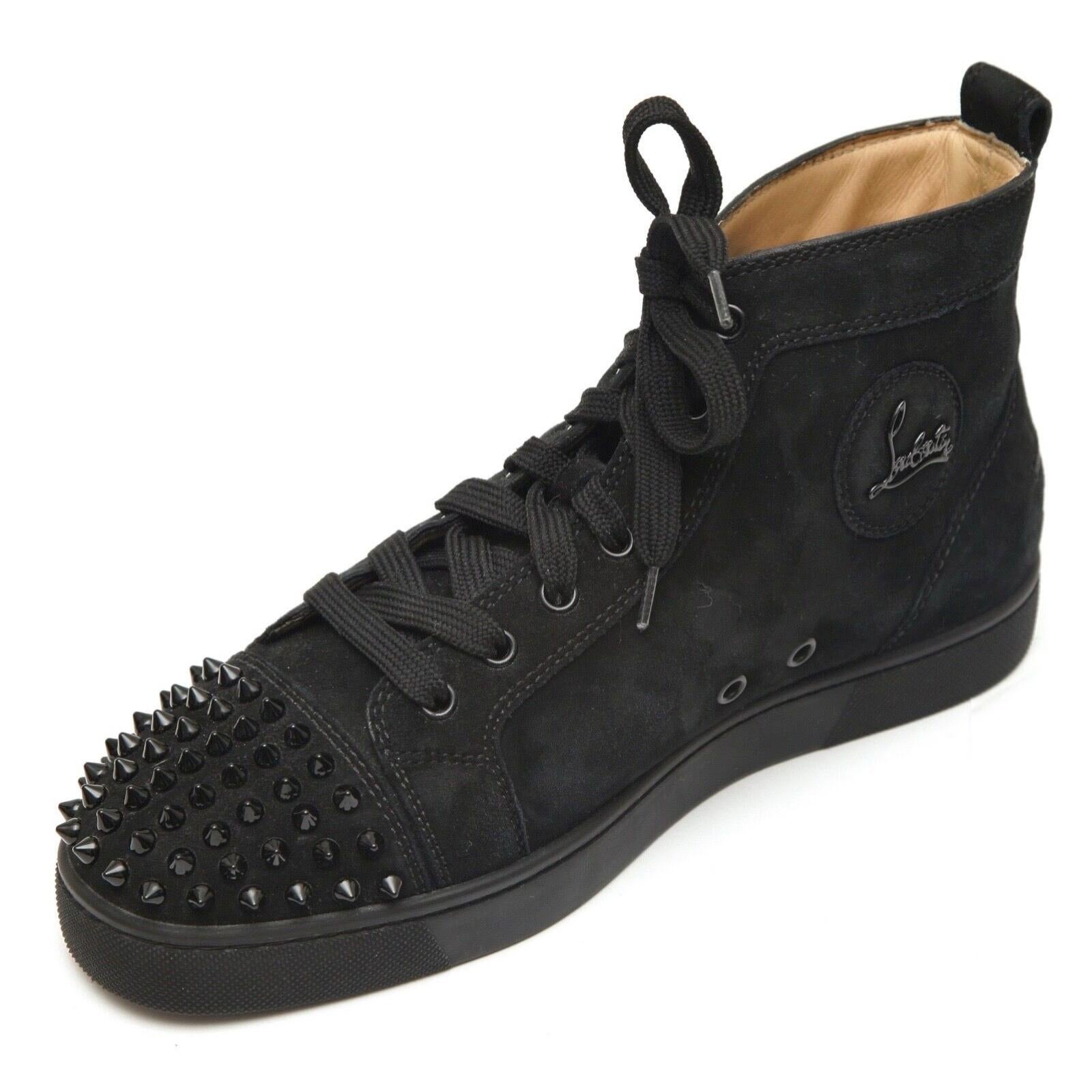 GUARANTEED AUTHENTIC CHRISTIAN LOUBOUTIN MEN'S LOU SPIKES ORLATO FLAT

Authenticated by Authenticatefirst

Design:
- High top sneaker style in black suede.
- Black spike rounded toe.
- Lace up closure.
- Leather lining.
- Red leather sole.
- Comes