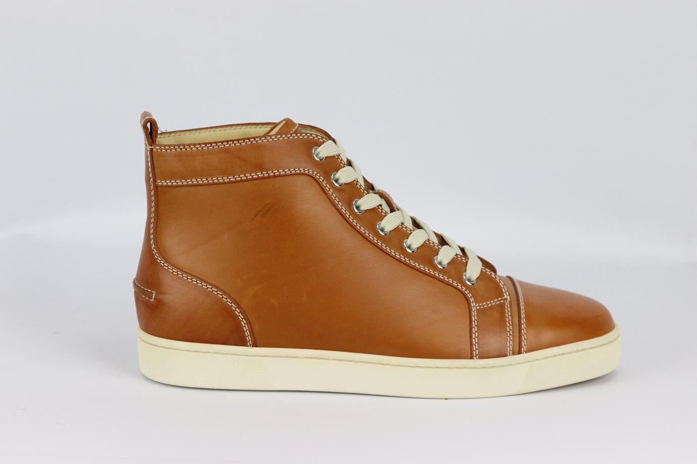 Christian Louboutin men's Louis leather high top sneakers. Tan. Lace up fastening at front. Comes with dustbag. Size: EU 42 (UK 8, US 9). Insole: 10.75 in. Heel: 1 in. Very good condition - Worn once. Slight wear to soles. Light scratching and mark