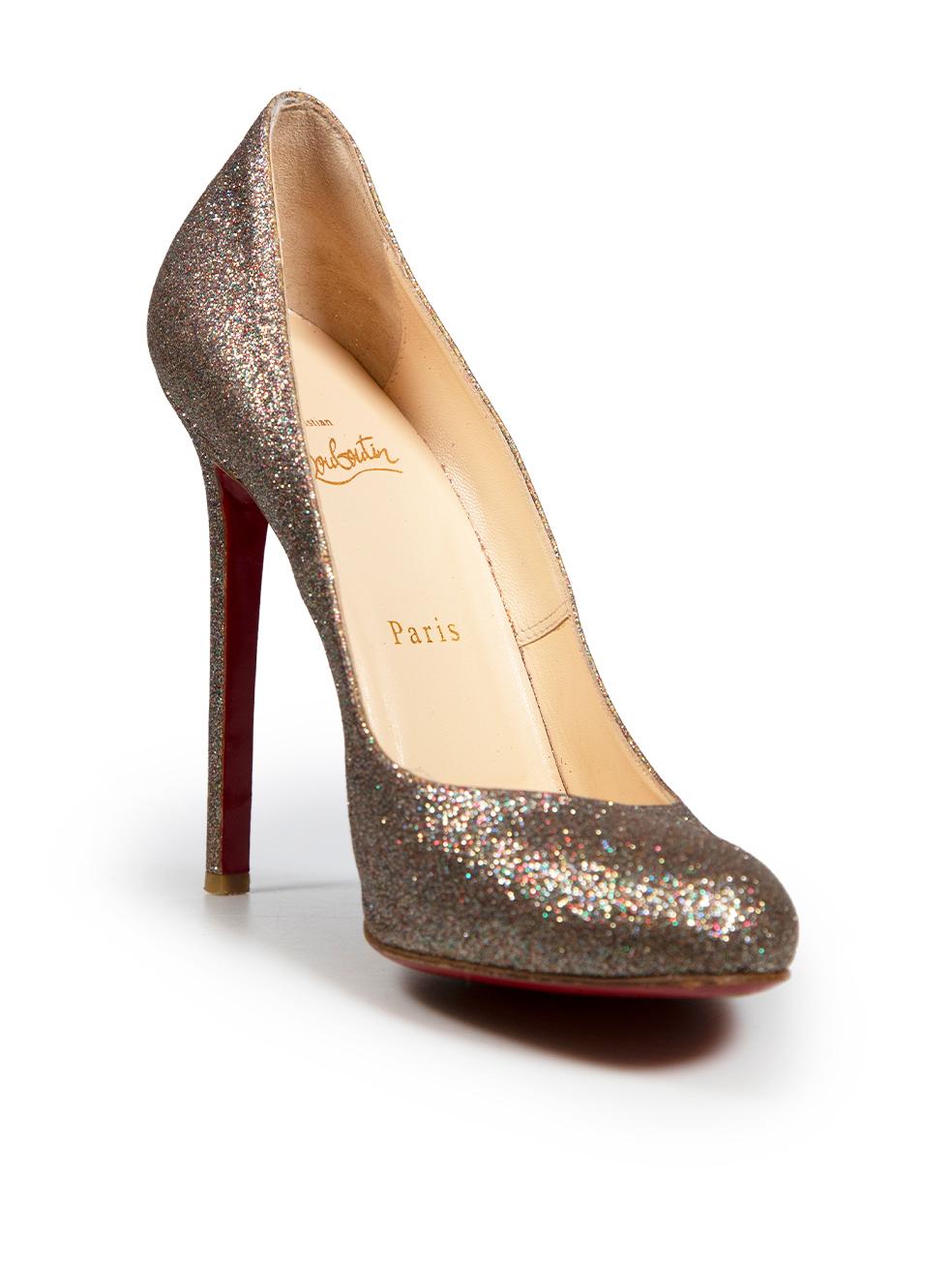 CONDITION is Good. Minor wear to shoes is evident. Light wear to both shoe heels and the left-side of the right shoe with discoloured marks and loose stitching on this used Christian Louboutin designer resale item.
 
 Details
 Metallic -
