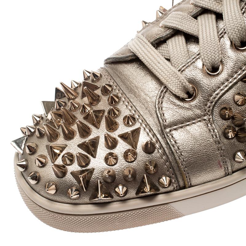 christian louboutin gold spike sneakers