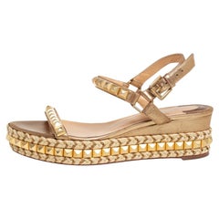 Christian Louboutin Metallic Gold Studded Leather Cataclou Espadrille Wedge  Sand at 1stDibs | christian louboutin espadrille wedges, louboutin studded  wedges, christian louboutin wedges gold