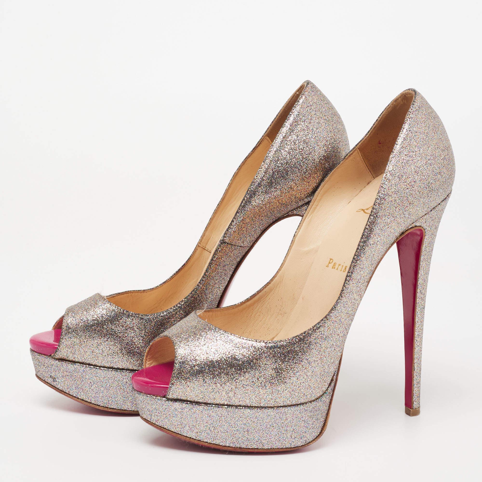 Stand out from the crowd with this gorgeous pair of Louboutins that exude high fashion with class. Crafted from glitter, this is a creation from their Lady Peep collection. It features a classic metallic shade with peep toes and a glossy exterior.
