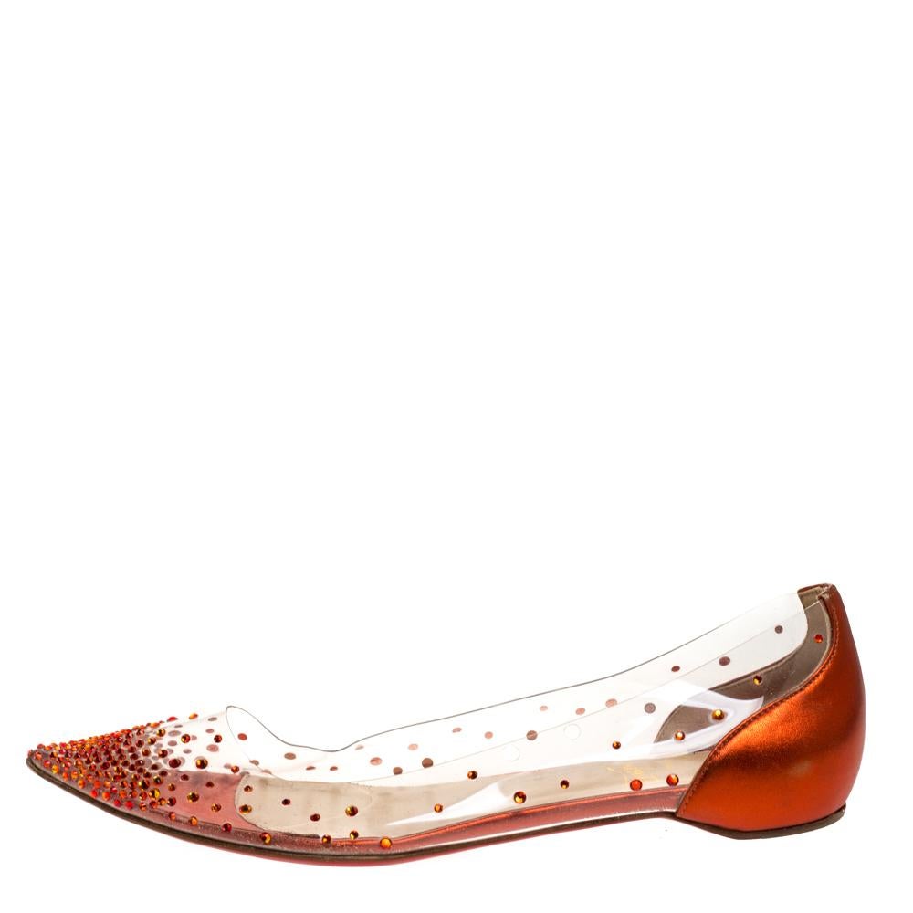 Be ready for constant attention and admirable gasps from your audience when you walk in these ballet flats from Christian Louboutin. Crafted from clear PVC, they carry pointed toes, leather counters, and crystals decorated all over. The pair is