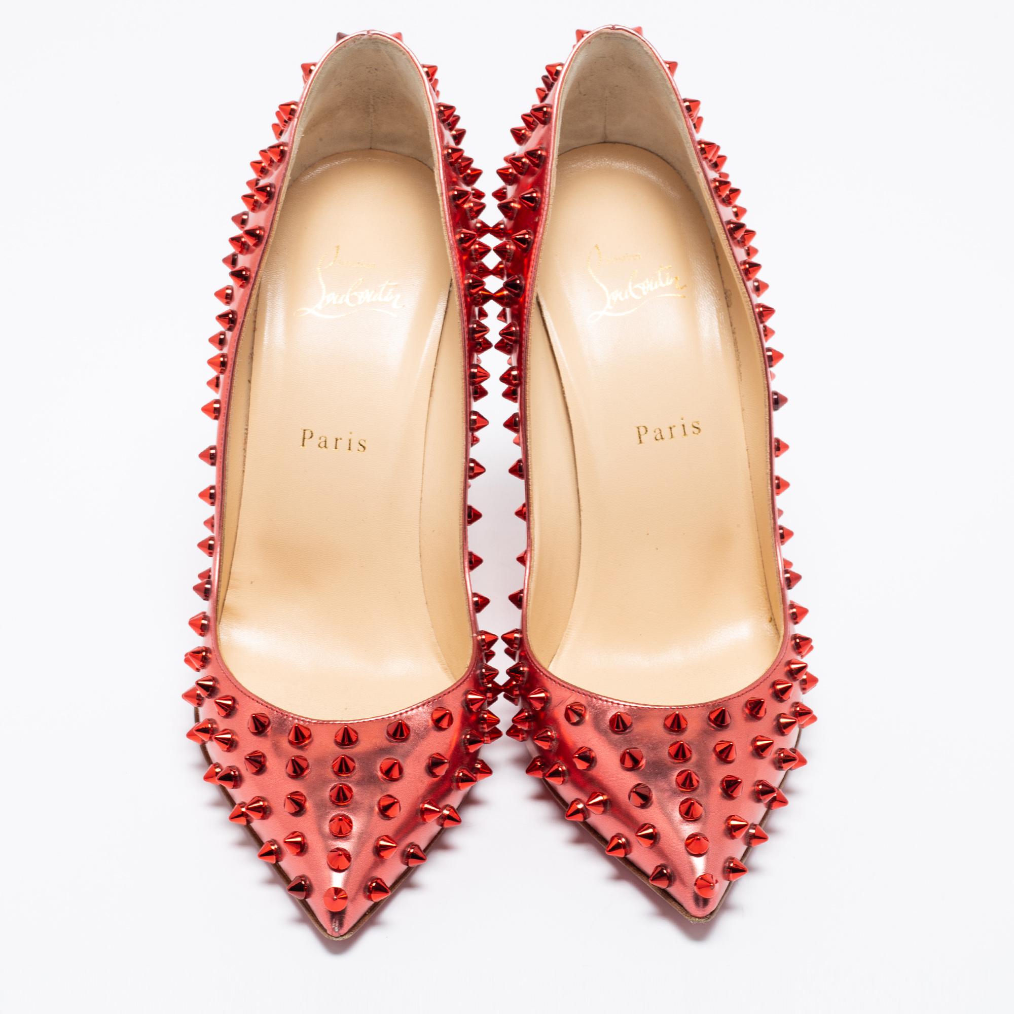 red spikey shoes
