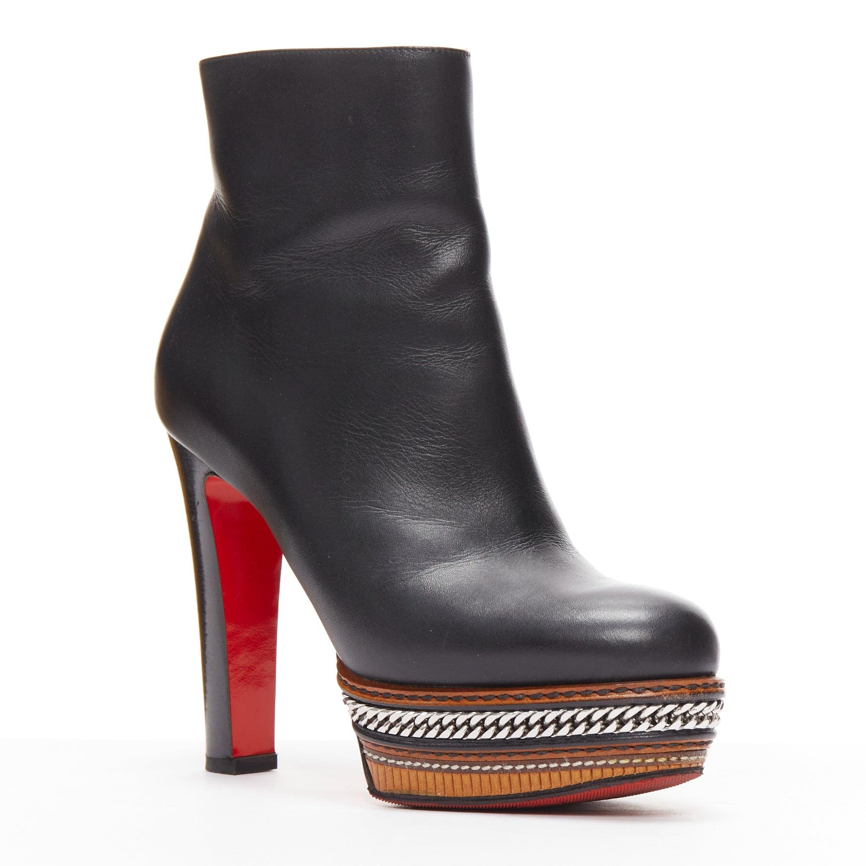 CHRISTIAN LOUBOUTIN Mille Tranche 120 black brown chain platform bootie EU37
Reference: TGAS/D00914
Brand: Christian Louboutin
Model: Mille Tranche 120
Material: Leather
Color: Black, Brown
Pattern: Solid
Closure: Zip
Lining: Tan Brown Leather
Extra