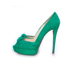 Christian Louboutin, Mint suede Greissimo pumps.