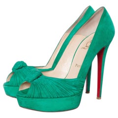 Christian Louboutin, Mint suede Greissimo pumps.
