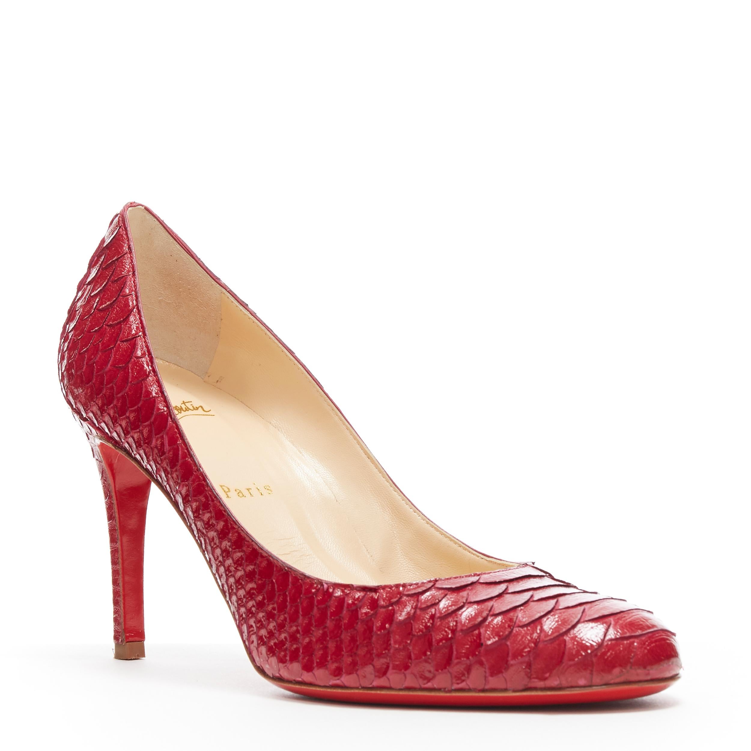 CHRISTIAN LOUBOUTIN Miss Gena 85 red glossy scaled leather almond toe pump EU38
Brand: Christian Louboutin
Designer: Christian Louboutin
Model Name / Style: Miss Gena 85
Material: Leather
Color: Red
Pattern: Other
Closure: Pull on
Lining material: