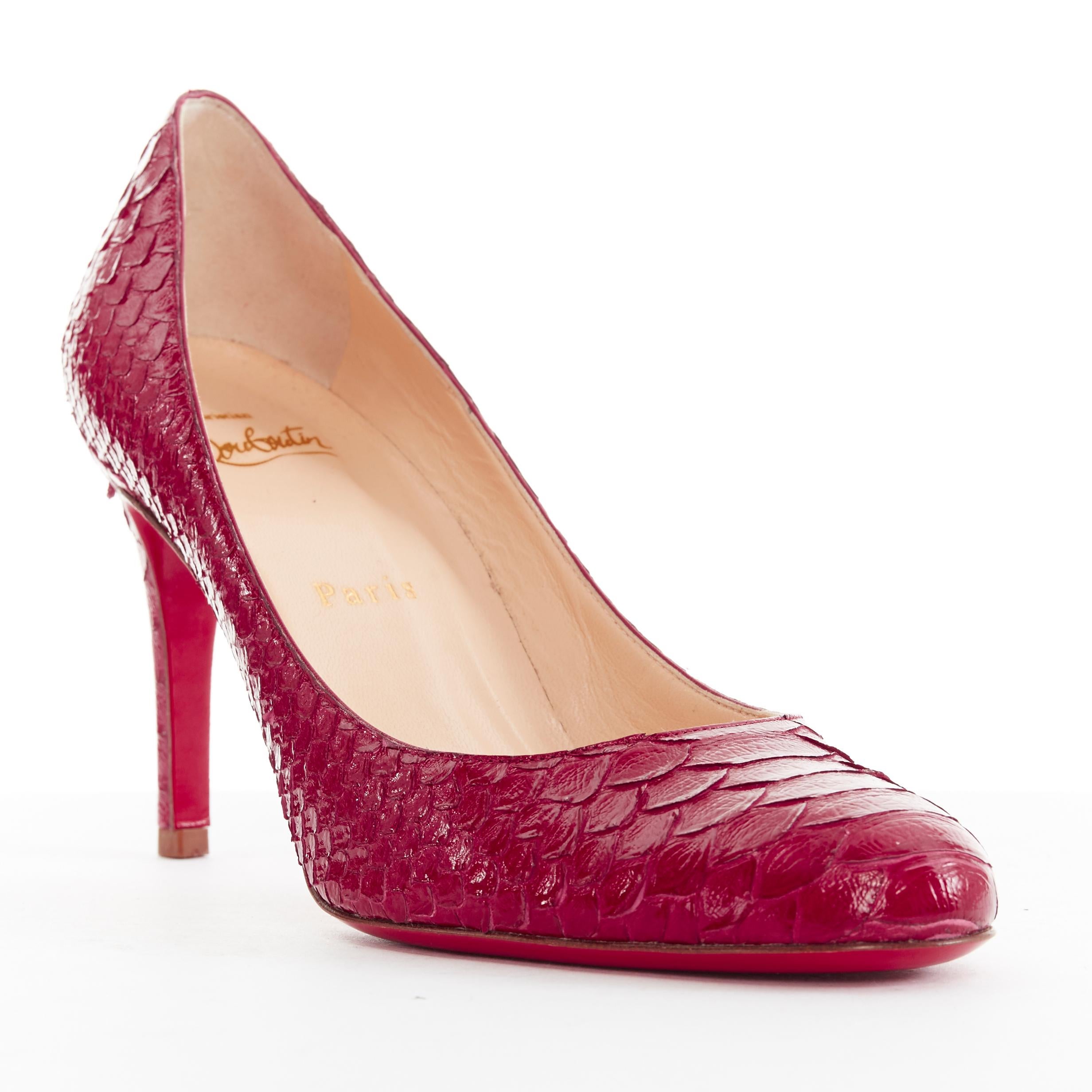 CHRISTIAN LOUBOUTIN Miss Gena 85 red glossy scaled leather round toe pump EU36.5 
Reference: TGAS/A02435 
Brand: Christian Louboutin 
Designer: Christian Louboutin 
Model: Miss Gena 85 
Material: Leather 
Color: Red 
Pattern: Solid 
Extra Detail:
