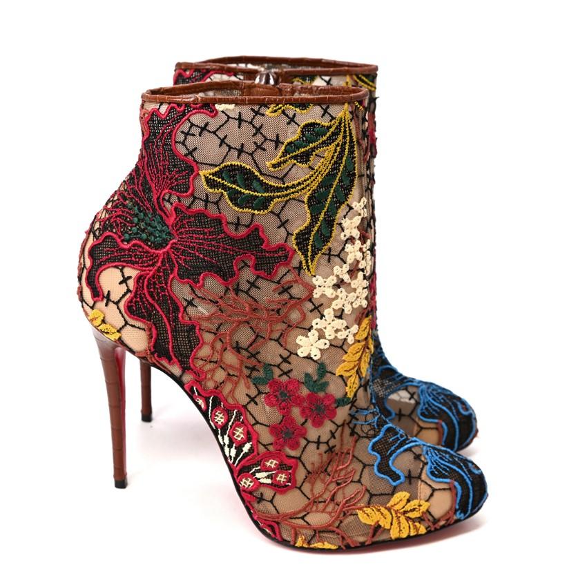 Christian Louboutin Miss Tennis Floral Embroidered Lace Bootie

- Nude mesh bootie covered in intricate multicolour floral embroidery 
- Almond toe, stiletto heel
- Crocodile effect brown leather trims and heel
- Inner ankle zip fastening
- Iconic