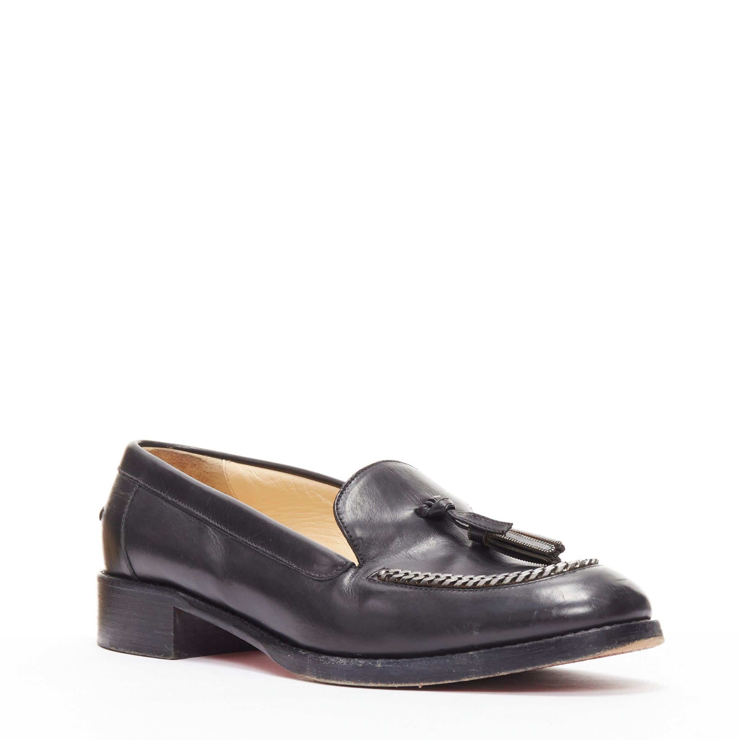 CHRISTIAN LOUBOUTIN Monaliso black leather chain trimmed tassel loafer EU38
Reference: CELG/A00398
Brand: Christian Louboutin
Model: Monaliso
Material: Leather, Wood
Color: Black, Silver
Pattern: Solid
Closure: Slip On
Lining: Brown Leather
Extra