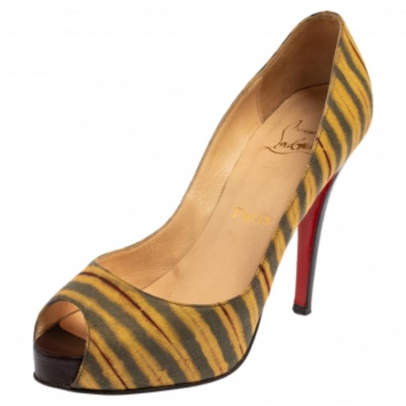 Those stylish outfits will look a lot more appealing with these Very Prive pumps from Christian Louboutin. They have been crafted from multicolor striped canvas into a peep-toe silhouette. They are made comfortable with leather-lined insoles and