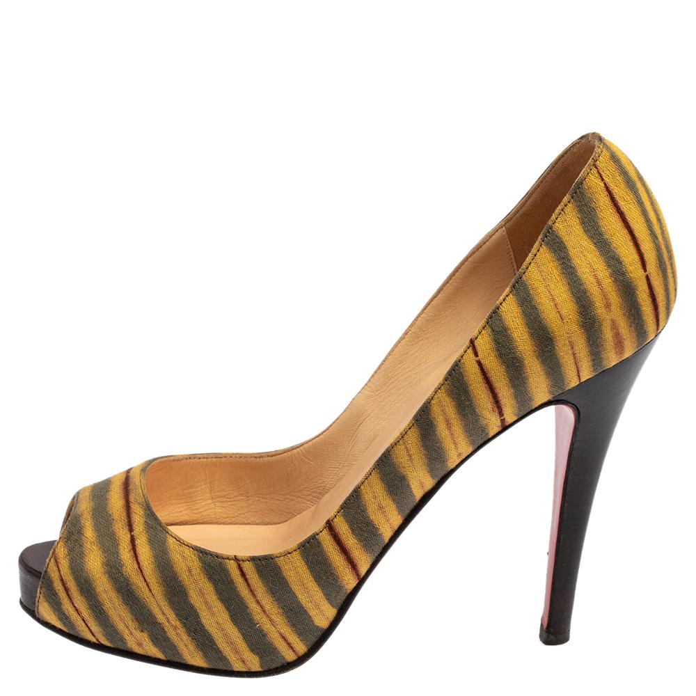 Those stylish outfits will look a lot more appealing with these Very Prive pumps from Christian Louboutin. They have been crafted from multicolor striped canvas into a peep-toe silhouette. They are made comfortable with leather-lined insoles and