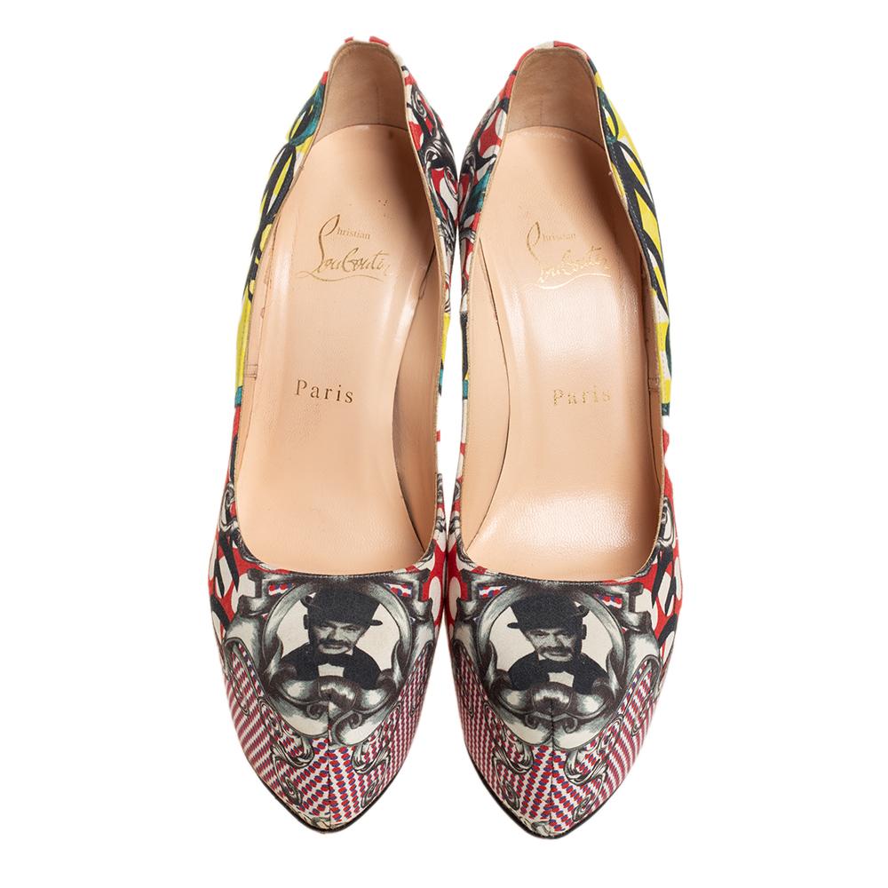 Take your love for Louboutins to new heights by adding this gorgeous pair to your collection. The pumps simply speak high fashion in every stitch and curve. The exteriors come made from multicolored fabric and the pumps are finished with platforms,