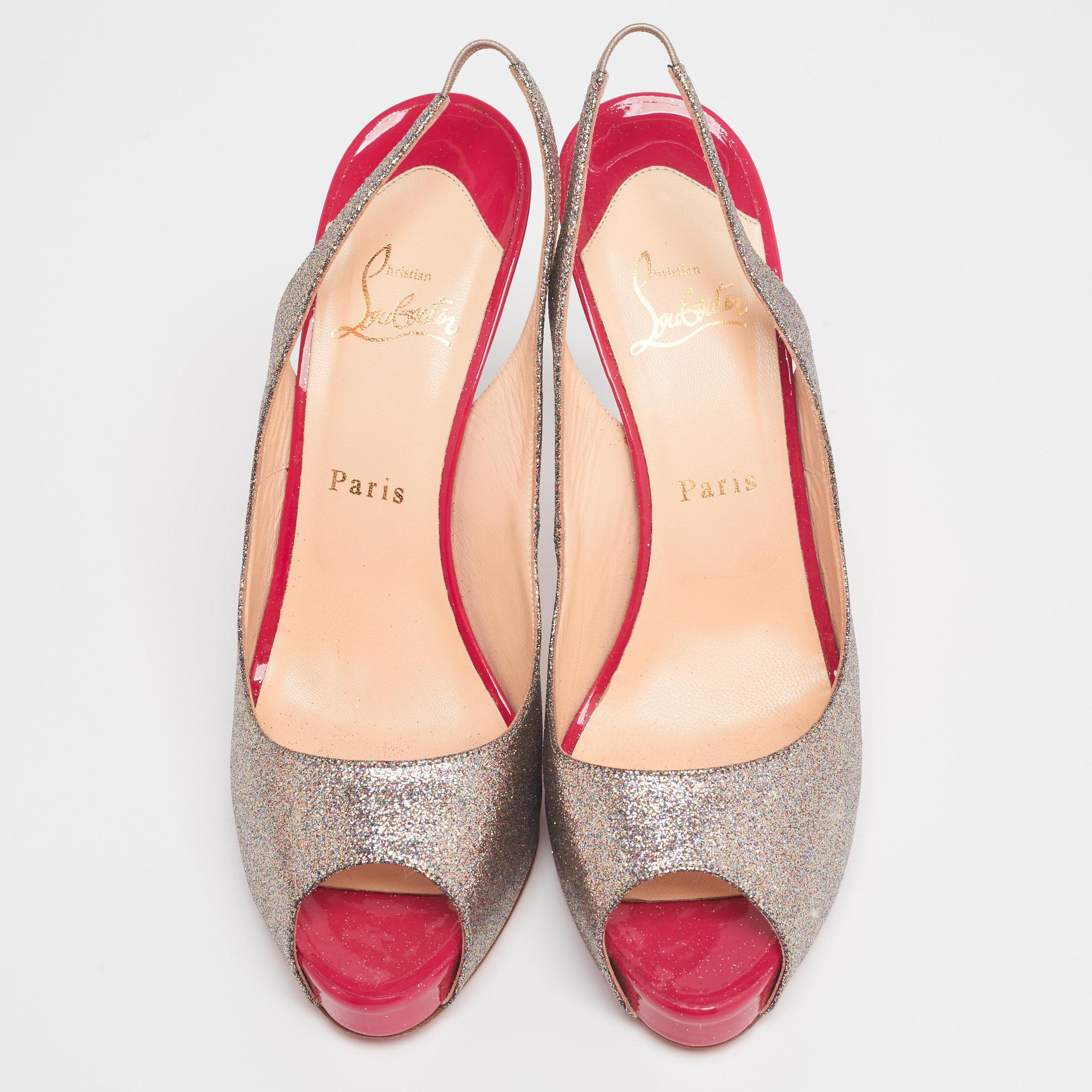 The architectural silhouette and sleek heels of this pair of Christian Louboutin pumps exemplify the brand's mastery in the art of stiletto making. Finely created from glitter, it has been detailed with slingback closure and peep toe. The signature