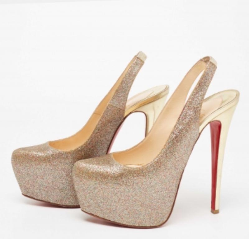 Christian Louboutin's timeless aesthetic and impeccable craftsmanship in shoemaking is evident in these statement pumps. Covered in multicolored glitter, the sleek cuts will accentuate the curve of your feet. Finished off with block heels and chunky
