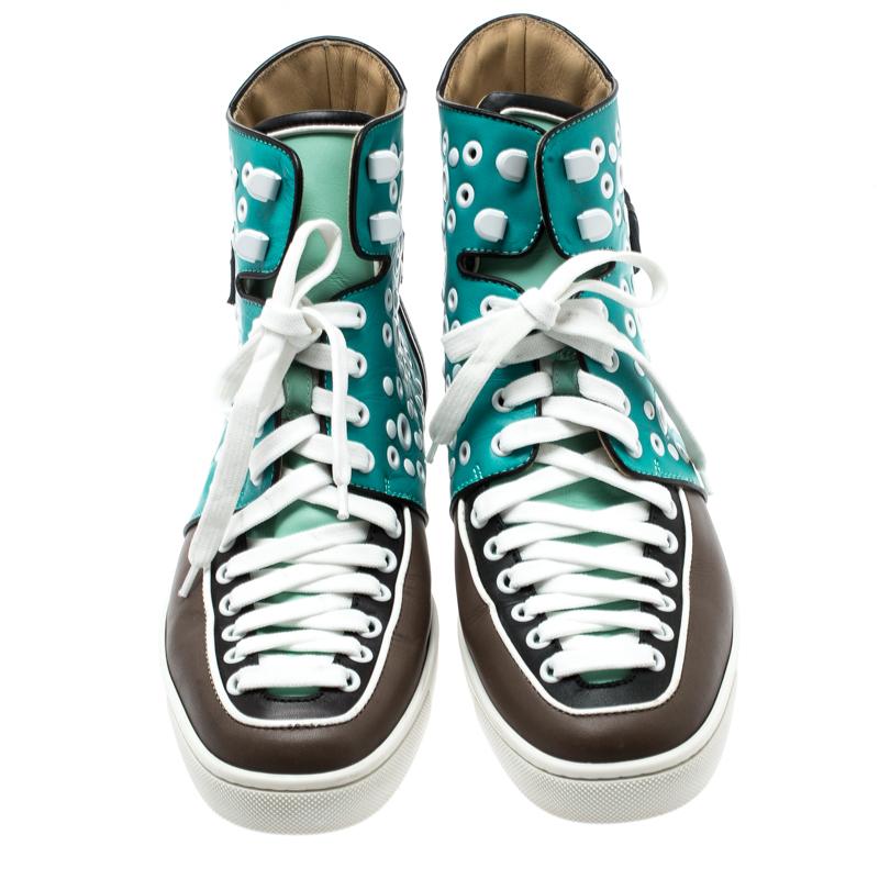 How chic and stylish are these Alfibully sneakers from Christian Louboutin! Crafted from multicolor leather, they feature round toes and lace-ups on the vamps. They have been styled with multiple white eyelets and buckled straps on the counters and