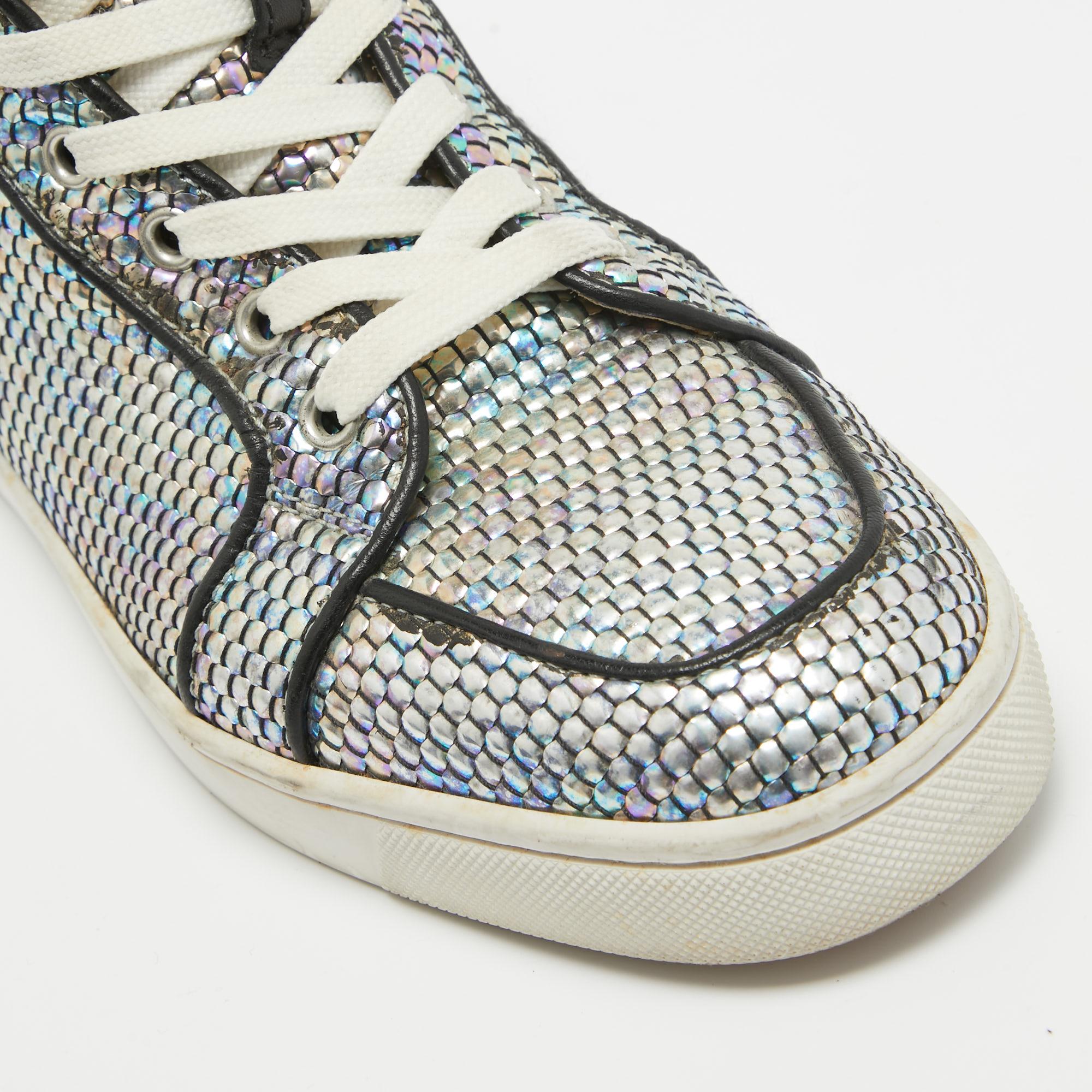 Coming in a classic silhouette, these designer sneakers are a seamless combination of luxury, comfort, and style. These sneakers are finished with signature details and comfortable insoles.

