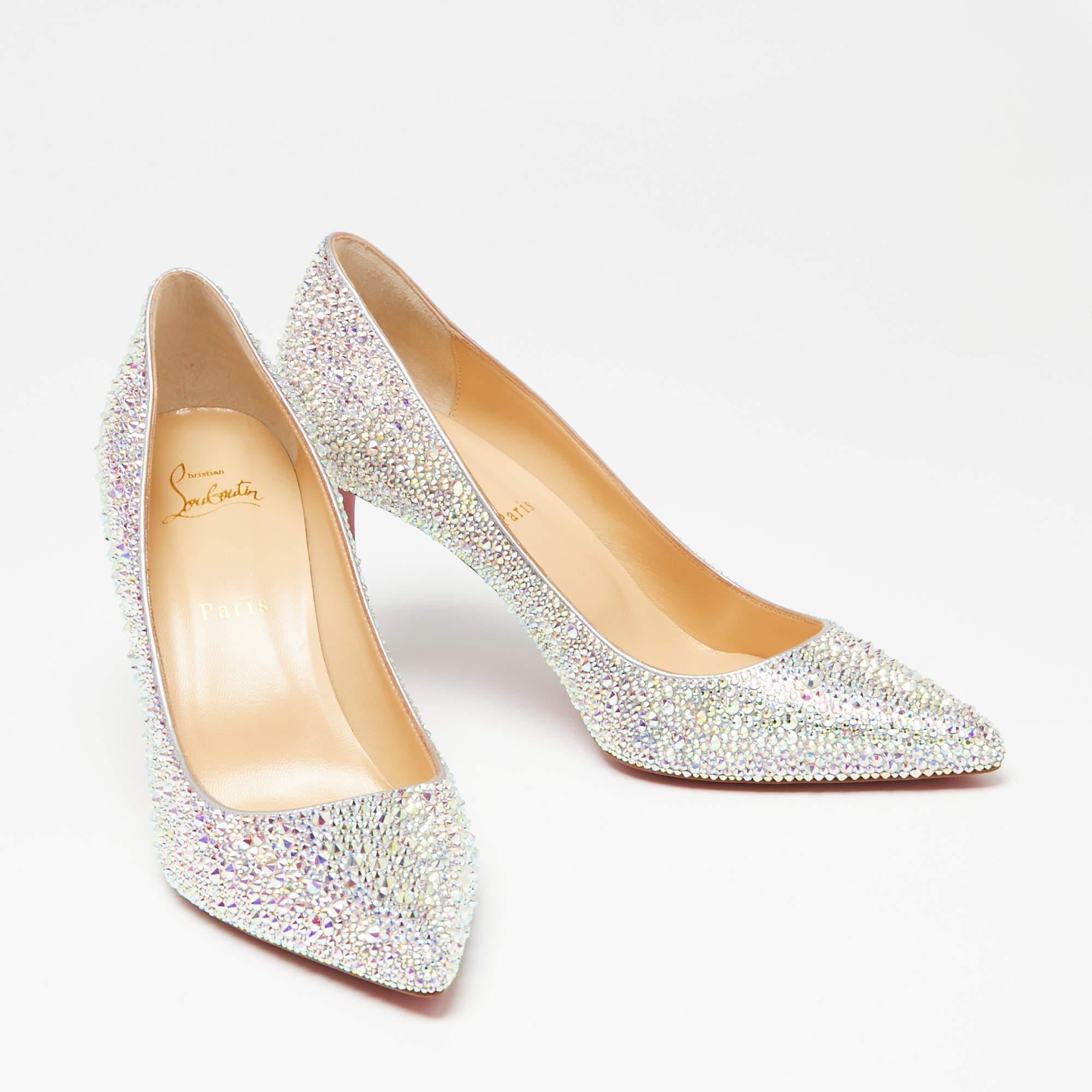One of Christian Louboutin's most loved styles is the Kate pumps. These here are crafted in leather, flaunting a beautiful multicolored exterior with shimmering studs all over, pointed toes, and 8.5 cm high heels that create a stunning