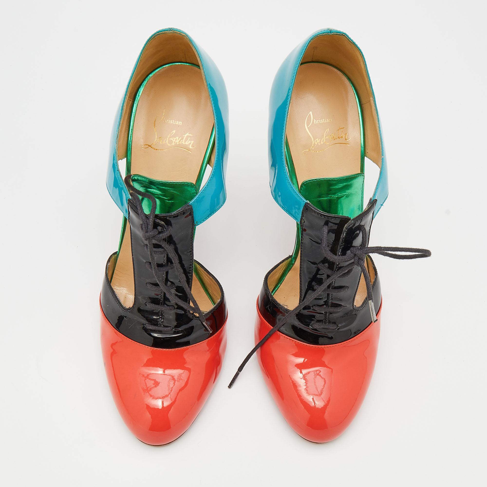 Christian Louboutin exudes its high craftsmanship and unique fashion taste with these stunning booties. They are brimming with exquisite details like the cutouts, the multicolored patent leather exterior, the laces, and the 11 cm heels. Grab this